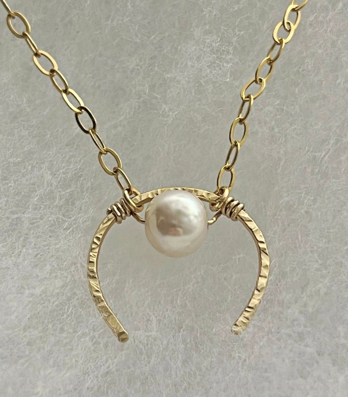 Collier "oméga"